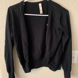 A light weight black button cover up